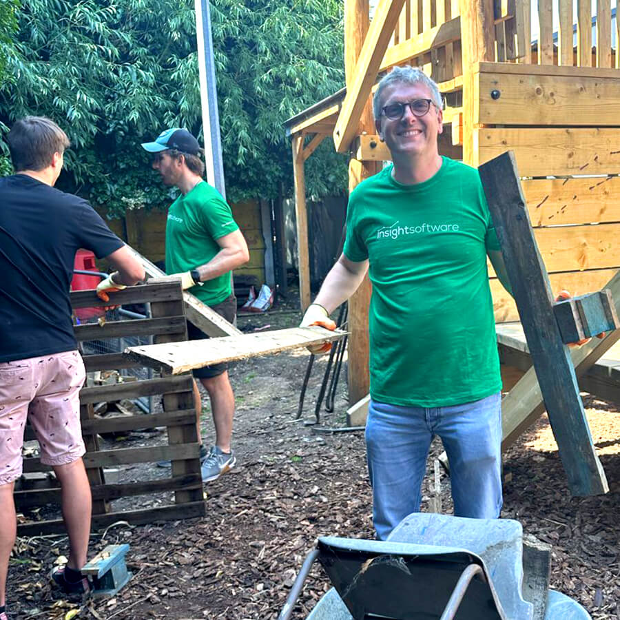 Insighters volunteering on an outdoor community build